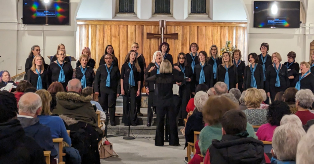 Suezelle in action with her choir group